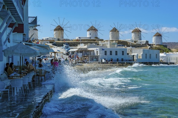Mykonos, Cyclades, Greece - The six sixteenth-century windmills, lined up on a hill above Mykonos Town, Mykonos Chora, are the island's landmark. Mykonos is part of the Cyclades archipelago in the Aegean Sea