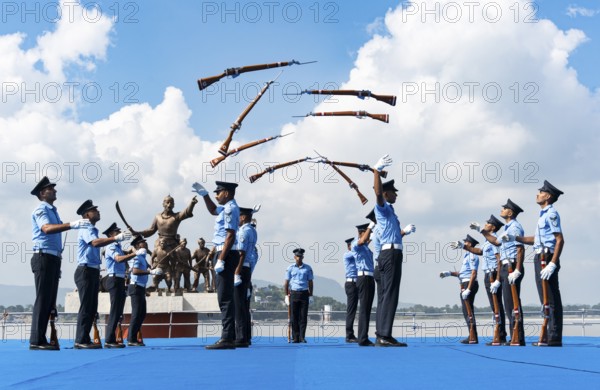 Indian Air Force personnel performs a bayonet drill demonstration on the bank of Brahmaputra river, during rehearsals ahead of the air show organised as part of the 93rd Air Force Day celebrations, on November 5, 2025 in Guwahati, India