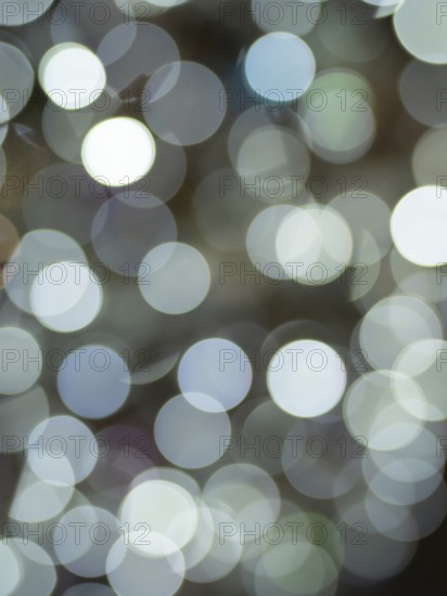 Soft, unfocused lights creating a dreamy, festive bokeh effect, ideal for backgrounds and holiday themes