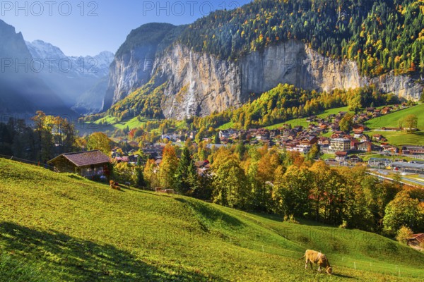 View of town and valley with Staubbach waterfall in autumn, Lauterbrunnen, Bernese Oberland, Canton of Bern, Switzerland
