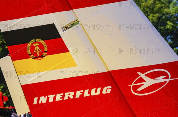 A PZL-106 AR Kruk agricultural aircraft with the registration D-FOAB and the original registration DDR-TAB as well as in the original colors of the company Agrarflug of Interflug as part of an air show on Rossfeld in Metzingen-Glems, Baden-Württemberg, Germany, for editorial use only