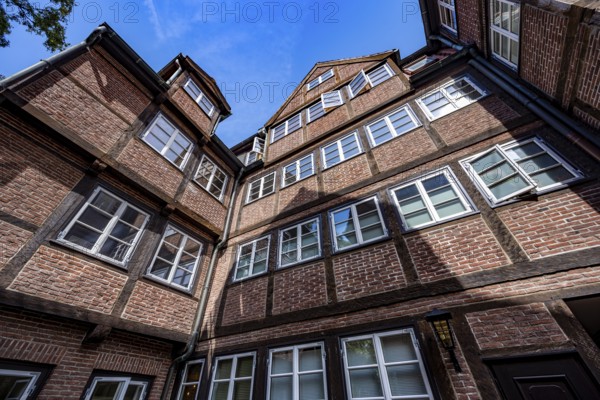 Facades of the historic brick buildings, inner courtyard, view over the city, Peterstraße, composers' quarter, Neustadt, Hamburg, Germany