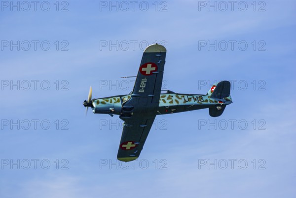 A Pilatus P-2 of Pilatus Flugzeugwerke AG with the registration D-EPII during a flight demonstration as part of an air show at the Rossfeld in Metzingen-Glems, Baden-Württemberg, Germany, for editorial use only