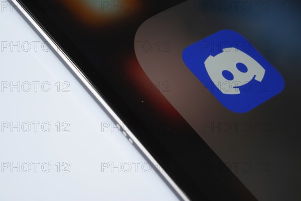 Dhaka, Bangladesh- 03 Oct 2025: A close up of an iPad screen displaying the Discord app