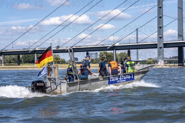 Multi-purpose boat of the THW during a training trip on the Rhine near Düsseldorf, the specialist group for water hazards, this type of boat is used to transport people and goods as a rescue boat and as a working platform, during the major exercise FÜLEX25, lasting several days, of the THW, Technical Relief Organisation, North Rhine-Westphalia regional association, over 3500 volunteers from the 127 North Rhine-Westphalia local associations practise many different deployment scenarios over 4 weekends