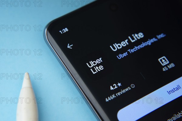 Dhaka, Bangladesh- 16 March 2025: The Uber app from Google Playstore is displayed on a smartphone screen