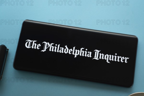 Dhaka, Bangladesh - 18 March 2025: The logo of the philadelphia inquirer is displayed on a smartphone screen