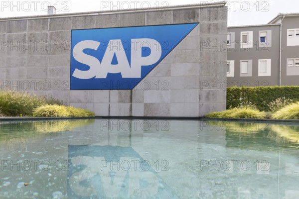 Logo and building of the software company SAP SE. Walldorf, Baden-Württemberg, Germany