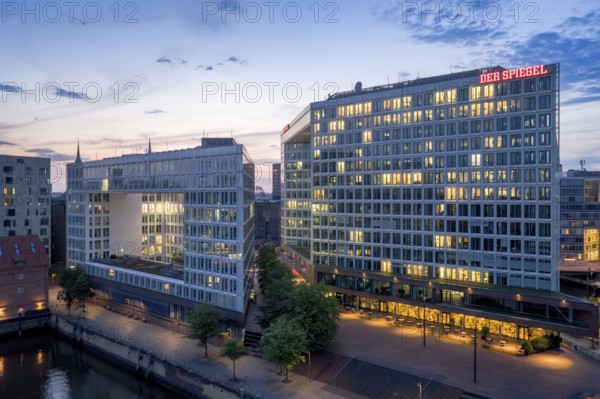 Aerial view of the Spiegel building at Ericusspitze in Hamburg's HafenCity in the Brooktorkai neighbourhood at blue hour, Hamburg, Germany