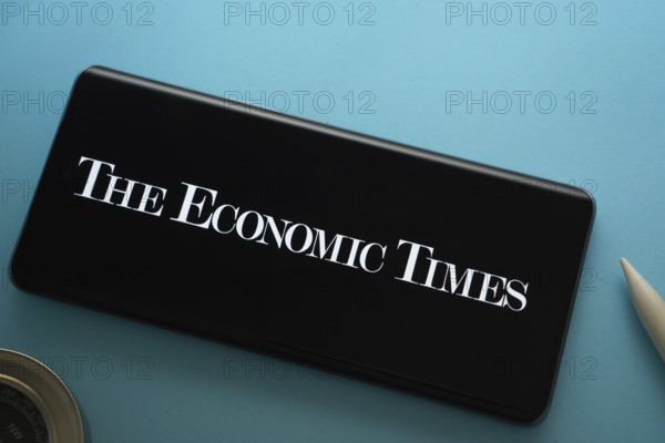 Dhaka, Bangladesh - 18 March 2025: The logo of The Economic Times is displayed on a smartphone screen