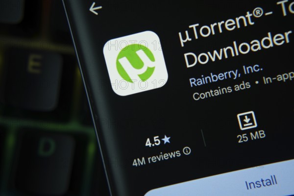 Dhaka, Bangladesh- 27 July 2025: uTorrent app from Google Playstore is displayed on a smartphone screen