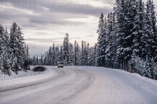 Winter road trip on the Icefields Parkway with lots of snow and ice, Banff National Park, Jasper National Park, Alberta, Canada