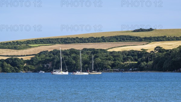 Boats on sea over Knoll Beach Studland, Poole, Dorset, England, United Kingdom