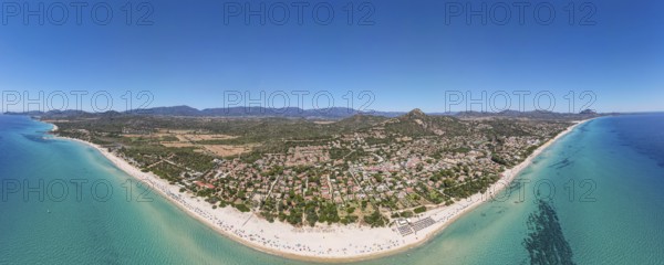 White sandy beaches and turquoise-blue sea stretch for several kilometres on the Costa Rei, a stretch of coastline on the Italian Mediterranean island of Sardinia, making the area one of the most popular holiday destinations in Europe. (Aerial view with a drone), Monte Nai, Costa Rei, Sardinia, Italy