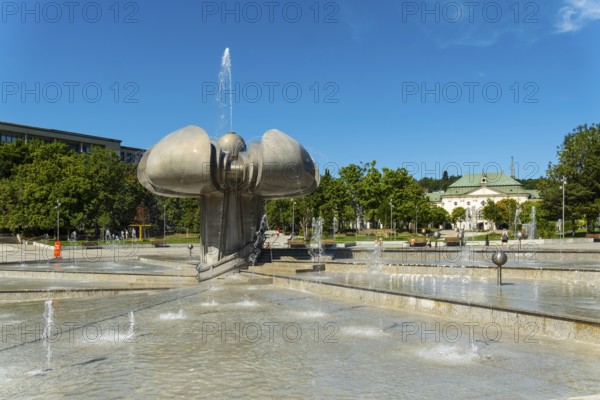 Freedom Square with a fountain in the shape of a lime blossom in Bratislava, Slovakia