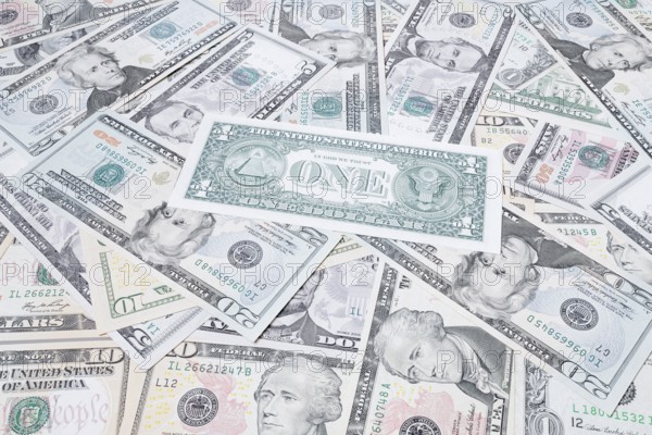 Various US dollar notes in a pile, banknotes