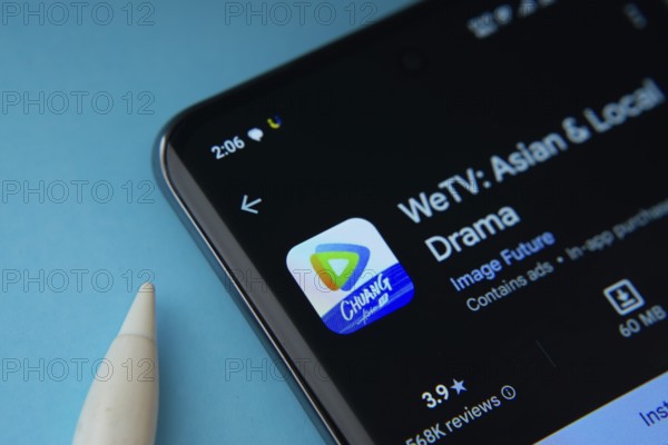 Dhaka, Bangladesh- 28 July 2025: WeTV app from Google Playstore is displayed on a smartphone screen