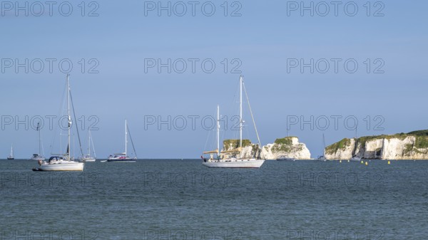 Boats on sea over Knoll Beach Studland, Poole, Dorset, England, United Kingdom