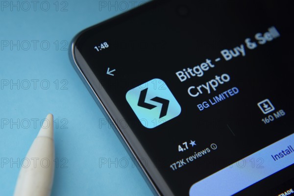 Dhaka, Bangladesh- 27 July 2025: Bitget app from Google Playstore is displayed on a smartphone screen