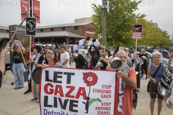 Detroit, Michigan USA - 26 July 2025 - Protesters rally at Eastern Market, banging empty pots to protest starvation in Gaza