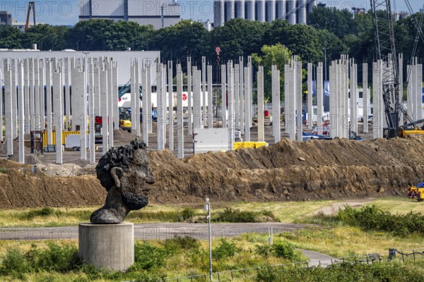 Construction of a new logistics hall on the Mercatroinsel, Hall 2, next to an existing hall, approx. 25, 000 square metres in size, in Duisburg-Ruhrort, shell construction, sculpture The Echo of Poseidon on the Rhine, North Rhine-Westphalia, Germany