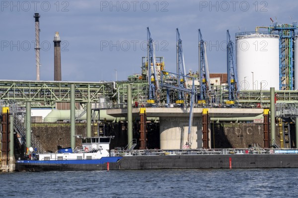 Scenery of Chempark Leverkusen, Bayer Leverkusen, chemical park, chemical plant, river Rhine, cargo ship, North Rhine-Westphalia, Germany