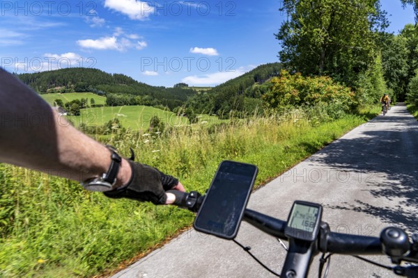 Sauerlandring cycle path, an 84 km long circular cycle path between the towns of Finnentrop, Eslohe, Schmallenberg and Lennestadt, mostly on former railway lines, here near Finnentrop-Serkenrode, Sauerland, North Rhine-Westphalia, Germany
