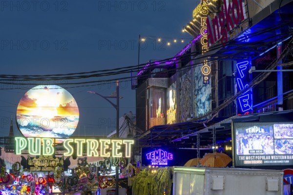 Neon lights, Pub Street in the evening, entertainment district with bars and restaurants, Siem Reap, Cambodia