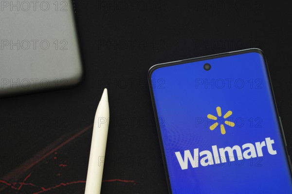 Dhaka, Bangladesh - 15 July 2025: The logo of the Walmart is displayed on a smartphone screen