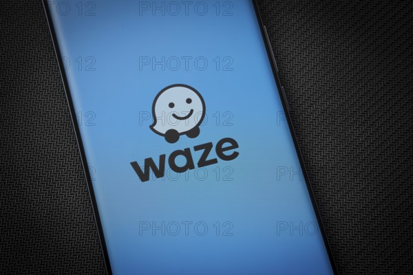 Dhaka, Bangladesh - 13 March 2025: The logo of the waze is displayed on a smartphone screen