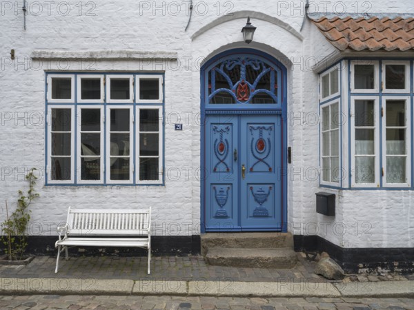 Beautiful ornate door mullion window, facade, old town, Husum, North Frisia, Schleswig-Holstein, Germany