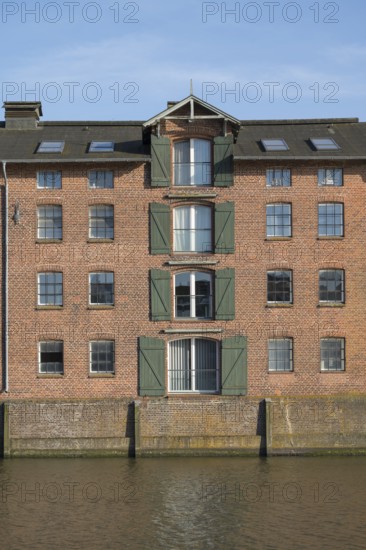 Warehouse building at the harbour, brick building, Husum, North Sea, North Frisia, Schleswig-Holstein, Germany