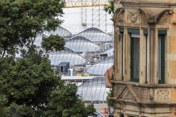 Stuttgart 21. construction site at the new through station. A glass roof construction provides the new railway station with natural light. Stuttgart, Baden-Württemberg, Germany