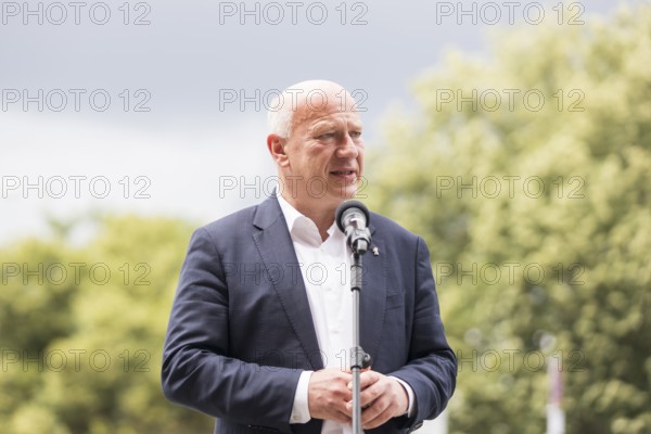 Kai Wegner (Governing Mayor of Berlin) gives a speech in front of the raising of the rainbow flag for Pride Week in front of the Rotes Rathaus in Berlin on 9 July 2025