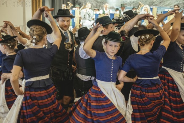Traditional traditional costume anniversary of the Trachtenverein Schliersee Stamm 1888, dance in the hall of the Bauerntheater, Schliersee, Upper Bavaria, Bavaria, Germany, 2025