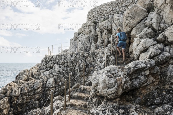 Picturesque wild hiking trail on the coast, Sentier du Littoral, Cap d'Antibes, Antibes, Provence Alpes Côte d'Azur, South of France, France