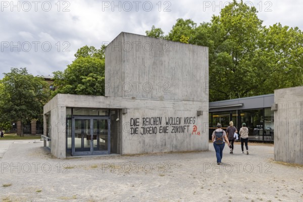 The rich want war. The youth want a future. Illegal protest at a building near the University of Stuttgart. Stuttgart, Baden-Württemberg, Germany