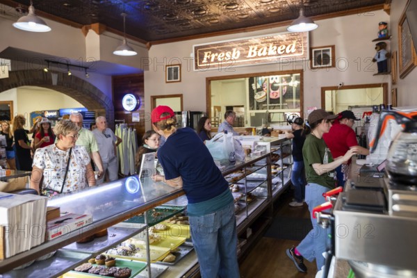 Clare, Michigan, The Cops and Doughnuts doughnut shop and bakery in a rural Michigan town. The shop opened in 1896 as the Clare City Bakery, it was bought and renamed by members of the Clare police department in 2009