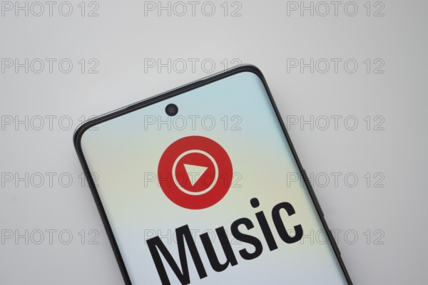 Dhaka, Bangladesh - 13 March 2025: The logo of the Youtube Music is displayed on a smartphone screen