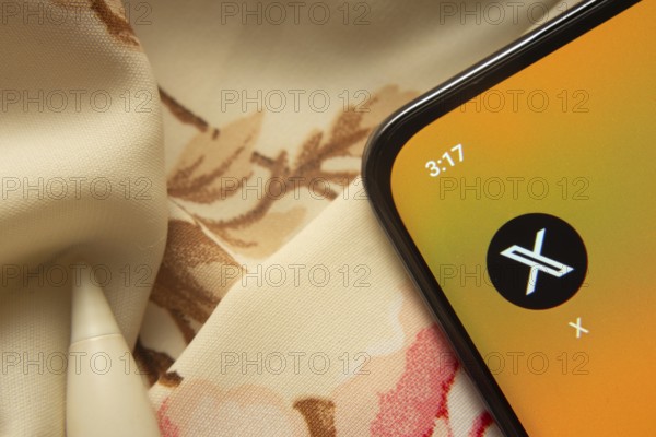 Dhaka, Bangladesh- 07 May 2025: Twitter (X) app icon is seen on smartphone