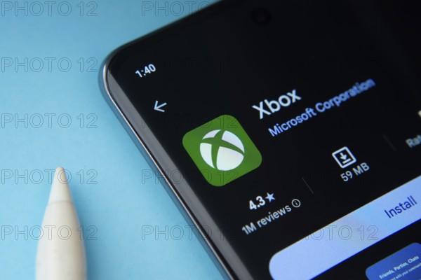 Dhaka, Bangladesh- 04 July 2025: The Xbox app from Google Playstore is displayed on a smartphone screen