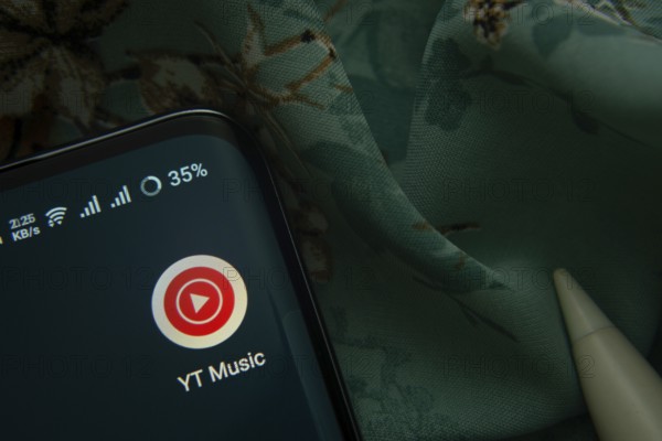 Dhaka, Bangladesh- 07 May 2025: Youtube Music app icon is seen on smartphone