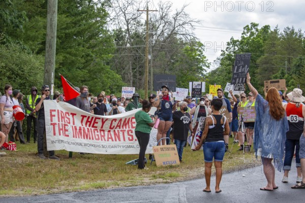 Baldwin, Michigan USA - 4 July 2025 - Activists rally against the North Lake Correctional Facility, which has just been reopened as the largest immigrant detention center in the Midwest. The rural Michigan facility is owned by the GEO Group and will house immigrants detained by ICE