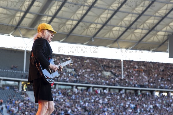 Angus Young, lead guitarist of AC/DC live on Power Up Tour 2025 at the Olympiastadion Berlin on 30 June 2025