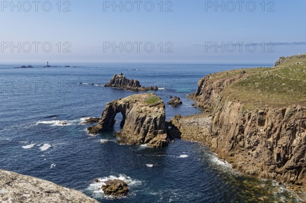 Rock formation and rock gate off the west coast of England in the Atlantic Ocean. Land's End, the tip of the headland in the west of Cornwall, is the most westerly point in England. Land's End, Sennen, Penzance, Cornwall, South West England, Great Britain