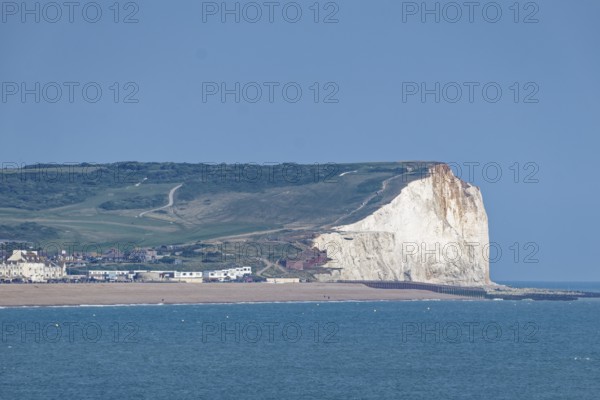 Beach and pier in Eastbourne, seaside resort on the English Channel, in the county of East Sussex, England, United Kingdom of Great Britain