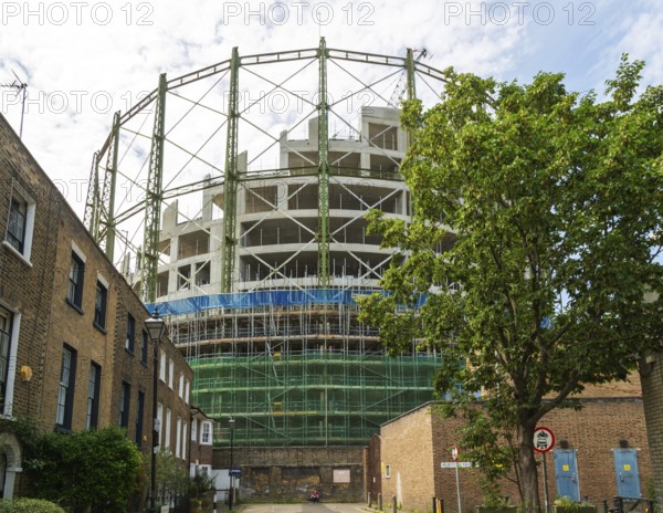 Construction project new apartments The Halo development inside Victorian gasometer, Oval Village by Berkeley, Vauxhall, Lambeth, London, England, UK
