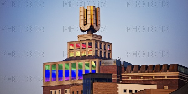 Dortmunder U, Flying pictures by Adolf Winkelmann at sunrise, Dortmund, Germany