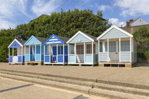 Seaside beach huts on the seafront at Southwold, Suffolk, England, UK