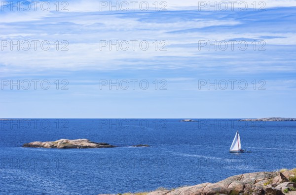Archipelago with sailing boats off the coast of Lysekil, Bohuslän, Västra Götalands län, Sweden, Scandinavia